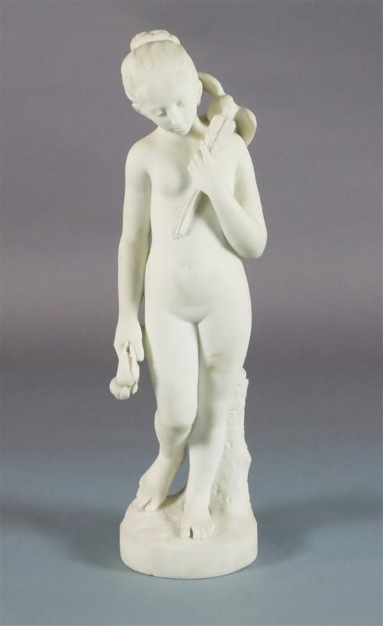 Bouzadou. A carved white marble figure of a nude girl feeding a sheath of corn to a bird on her shoulder, height 29.5in.